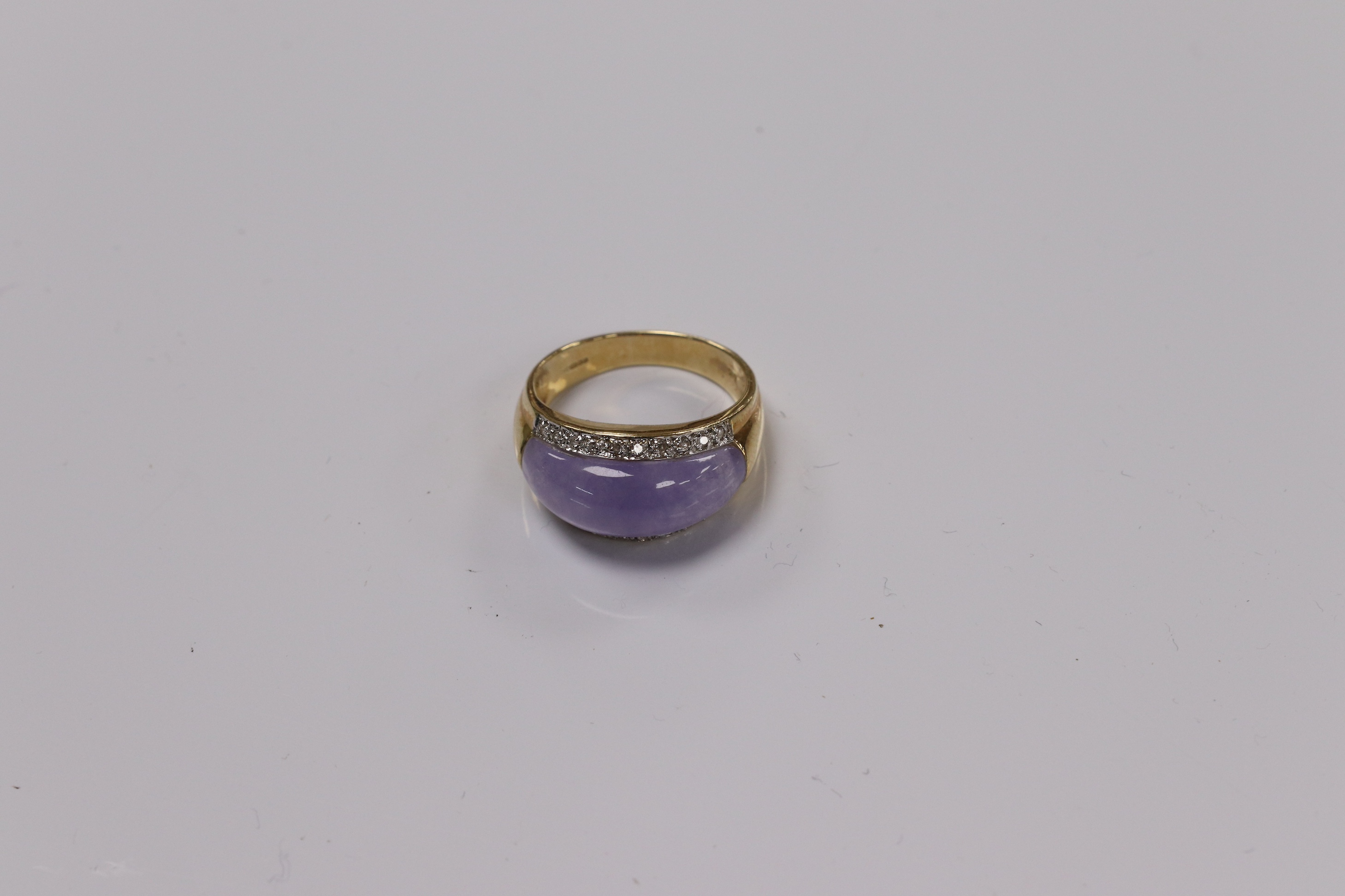 A modern 14k, lavender jade and diamond chip set demi-lune ring, size Q, gross weight 5.6 grams. Condition - fair